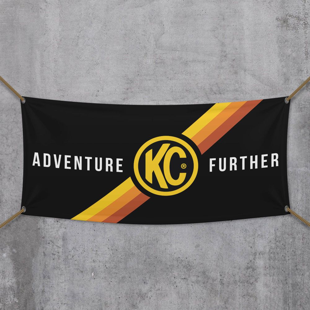 KC HiLites 36"x72" KC Banner Adventure Further Outdoor Black / Yellow KC Logo 99021